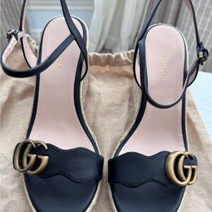 Gucci Black Sandals with Gold Buckles